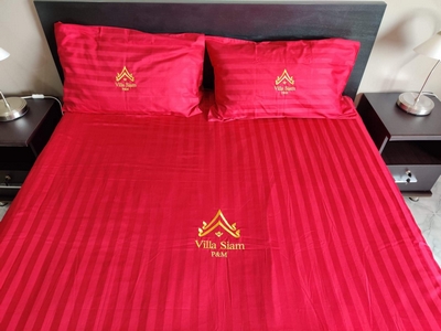 queen size avec logo de la villa Siam